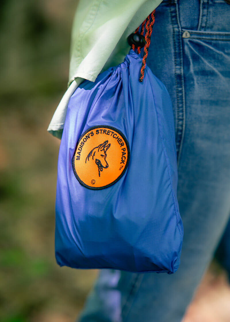 Portable emergency pet stretcher / dog stretcher / animal stretcher that you can wear and stuff into a bag. Perfect for hiking.